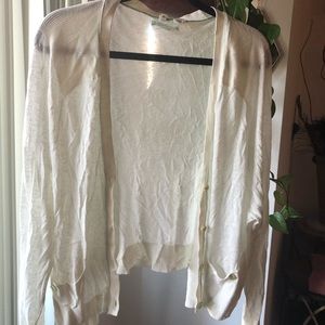 Cream colored/ off white gauzy loose fit cardigan.